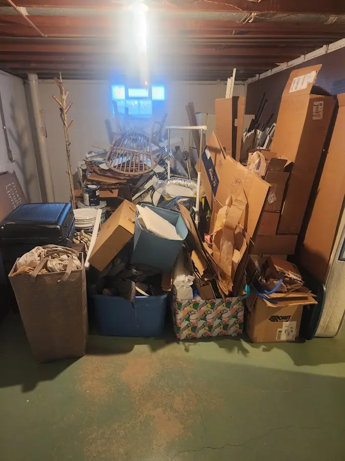 Roll-off dumpster container at job site for 20 Yard Dumpster Rental in Sewanee